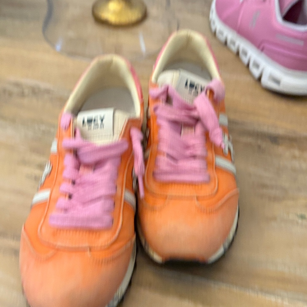 Premiata Lucy Sneakers In Orange with pink laces